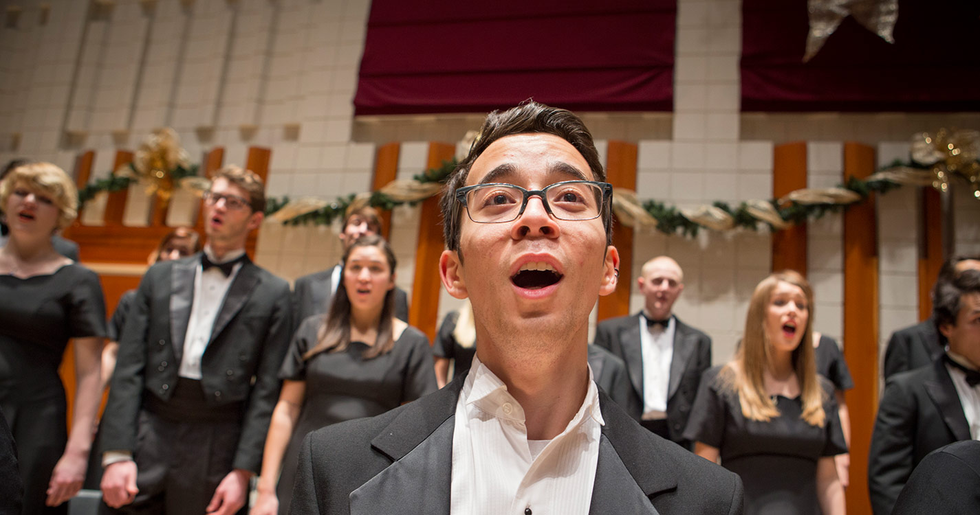 Willamette students singing in a concert in Hudson Hall